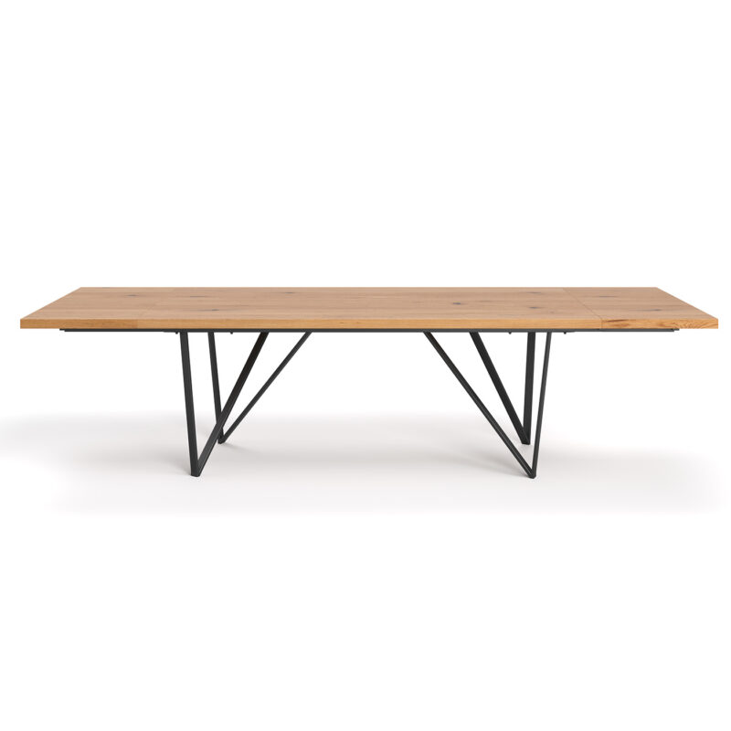 Stół Ravel z dostawkami wykonany z litego drewna dębowego i metalu.