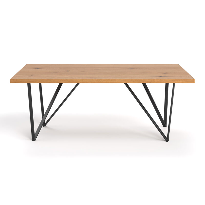 Stół Ravel wykonany z litego drewna dębowego i metalu.