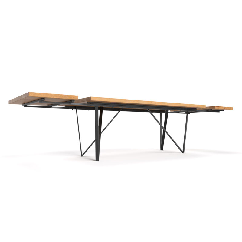 Stół Ravel z dostawkami wykonany z litego drewna dębowego i metalu.