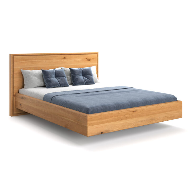 Łóżko lewitujące Valor wykonane z litego drewna dębowego.
