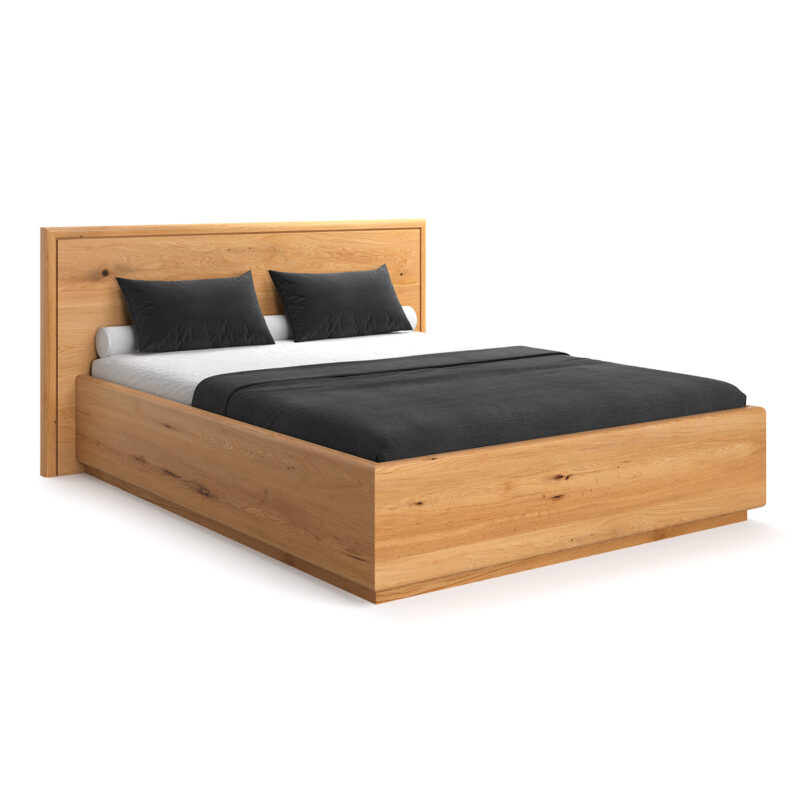 Łóżko Valor z pojemnikiem wykonane z litego drewna dębowego.